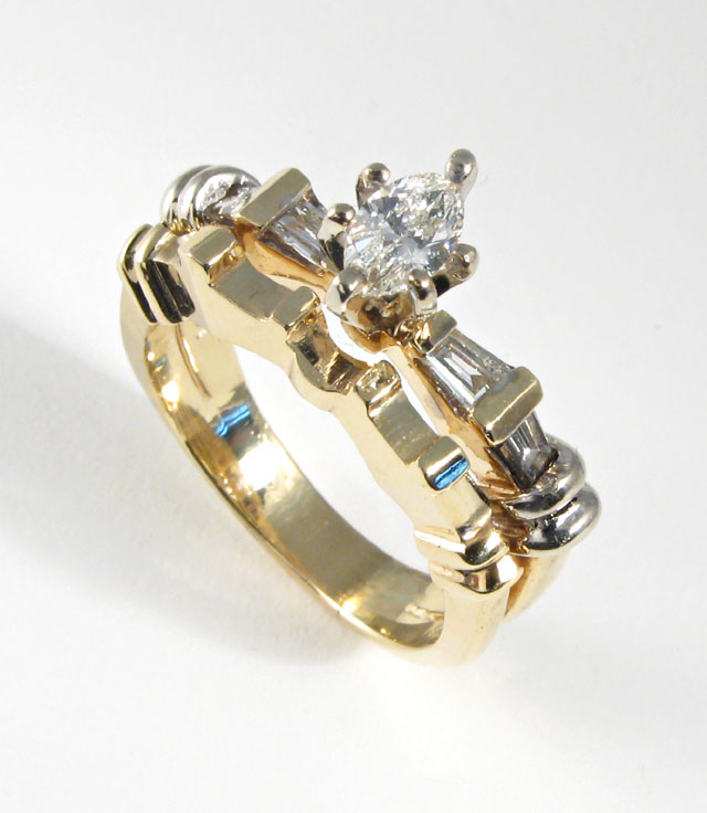 Appraisal: DIAMOND AND FOURTEEN KARAT GOLD RING set with a marquise-cut