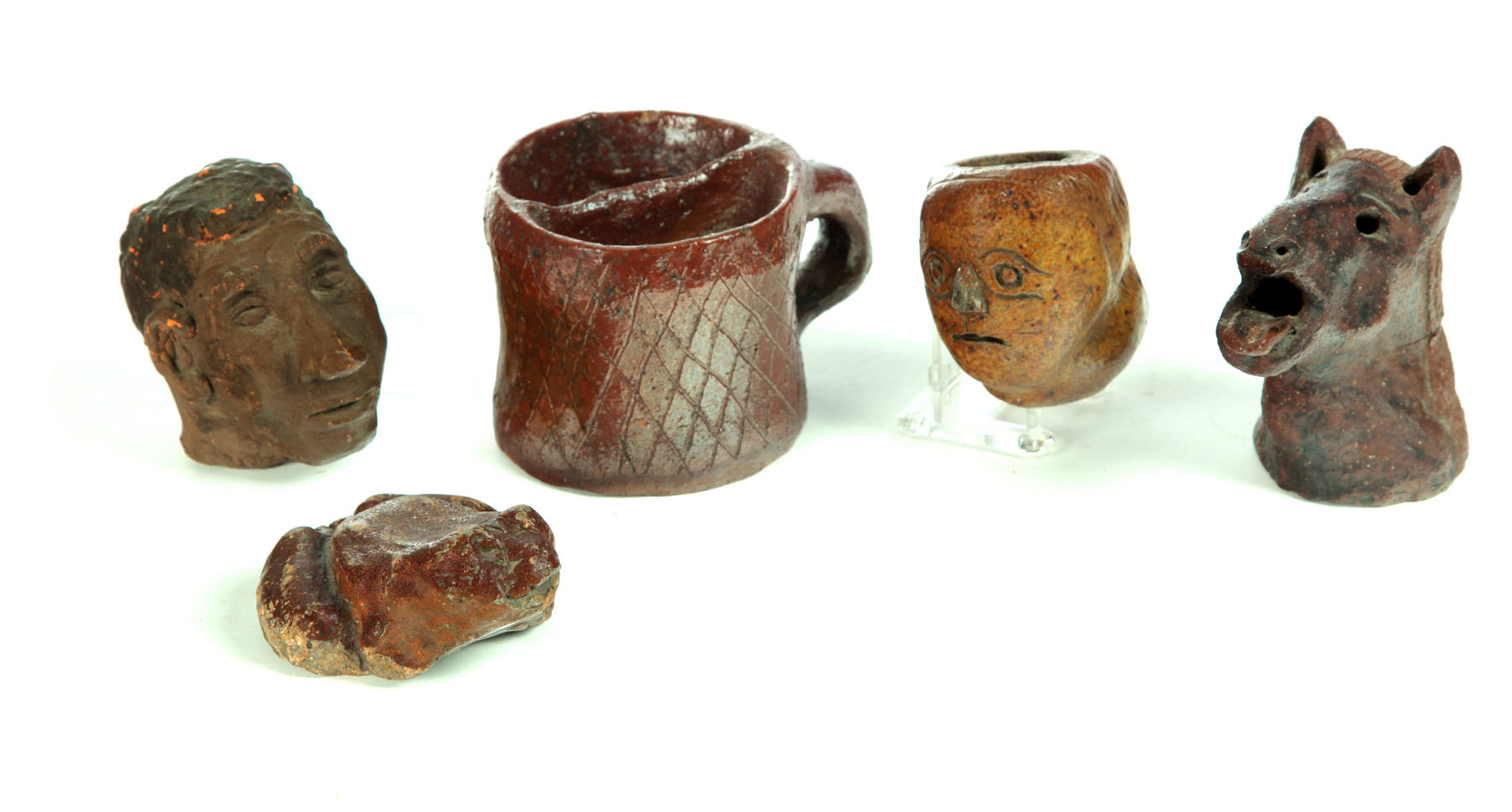 Appraisal: FIVE SEWERTILE WHIMSEYS American late th- th century Incised mug