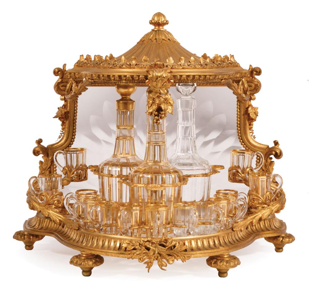 Appraisal: Baccarat-Style Gilt Bronze and Crystal Tantalus c hinged lid with