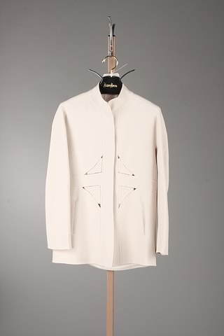 Appraisal: CHADO long creme jacket with signature stitching and cut-outs with