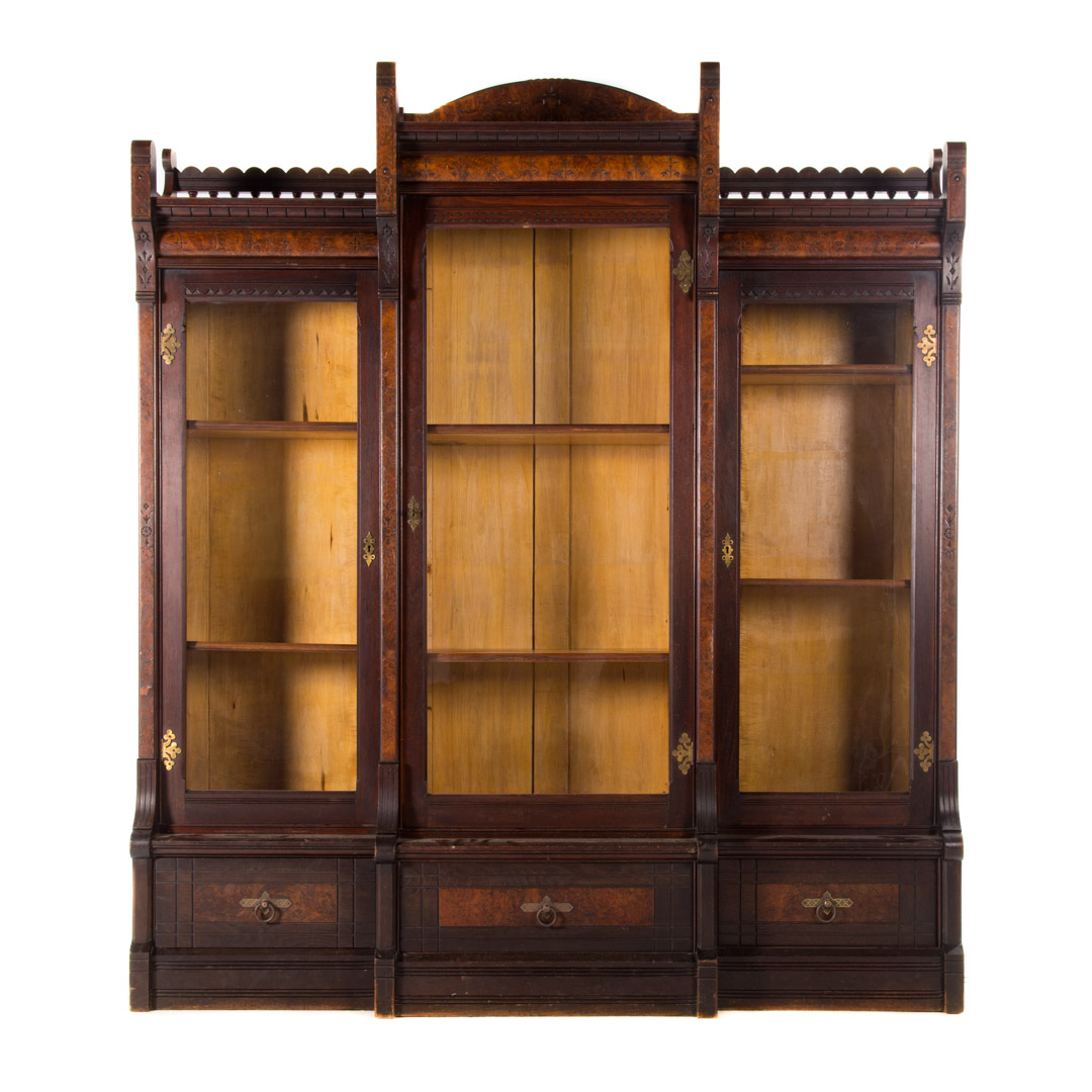 Appraisal: American Eastlake style carved mahogany bookcase circa three sections with