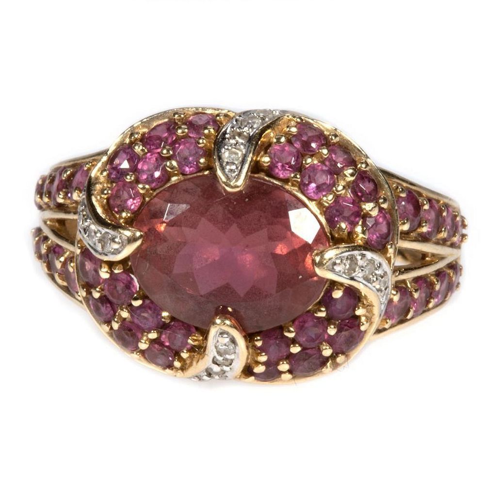 Appraisal: Garnet pink tourmaline diamond and k gold ring centering an