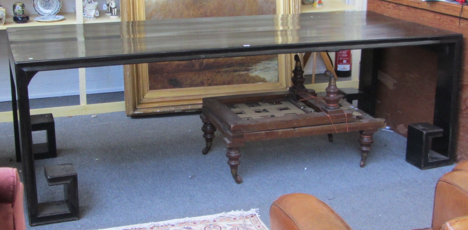 Appraisal: A large th century Chinese ebonised calligraphy table the rectangular