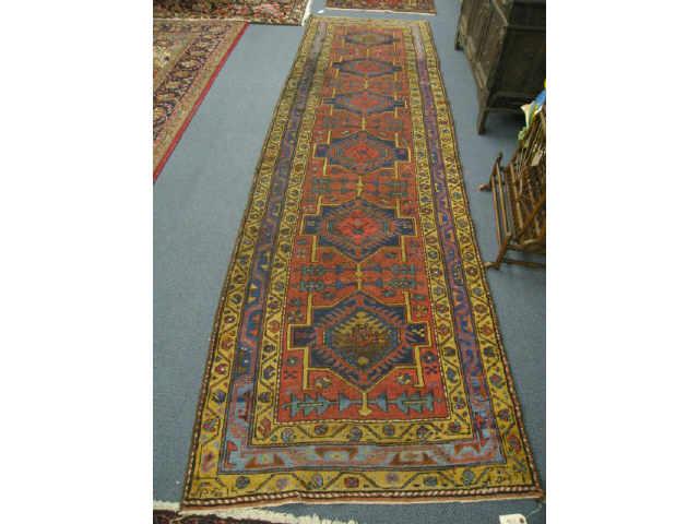 Appraisal: Heriz Persian Handmade Runner goemetric medallions with alternating floral geometric