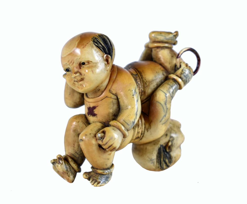 Appraisal: CHINESE FIGURAL GROUP OF TWO YOUNG ACROBATS th Century or