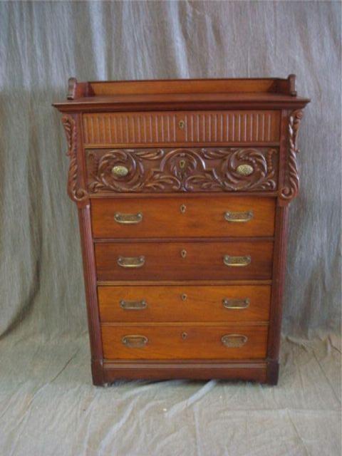 Appraisal: Walnut Carved Tall Chest with Gallery Top Dimensions wide x