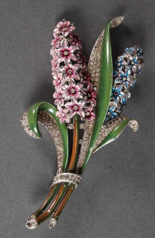 Appraisal: Trifari rhinestone enamel and silvered metal bouquet-form brooch Estimate -