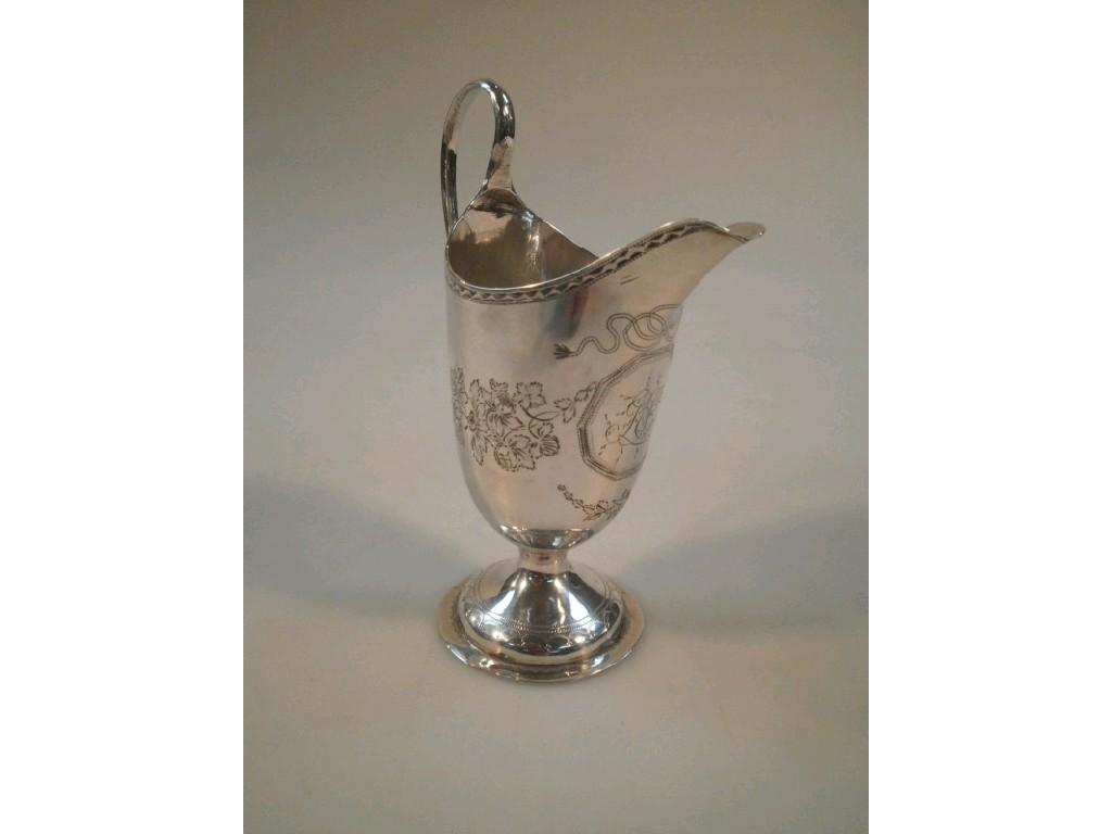 Appraisal: George III silver helmet-shaped cream jug with bright cut border