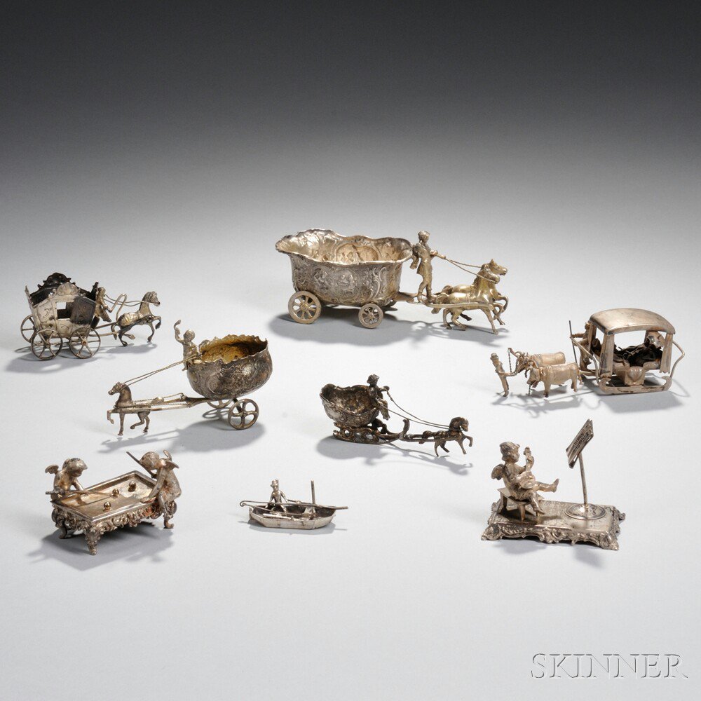 Appraisal: Eight Small Silver Figural Groups five with horse- or ox-drawn