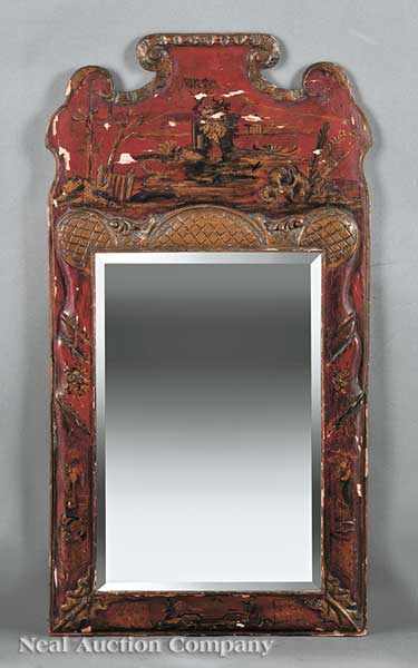 Appraisal: An Antique English Red Japanned Mirror th c carved crest