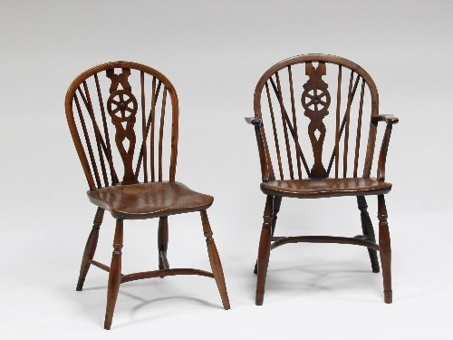 Appraisal: A yew wood and elm wheel back armchair and single