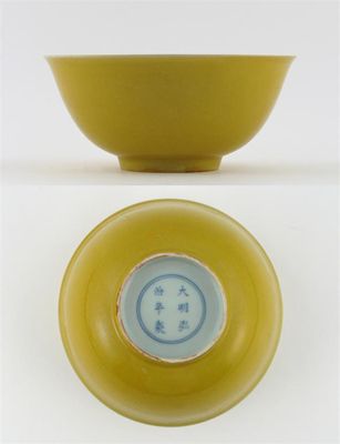 Appraisal: A Chinese Imperial yellow-glazed bowl with flared sides and slightly