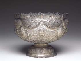 Appraisal: SOUTH EAST ASIAN SILVER CENTERPIECE Very elaborate repouss South East