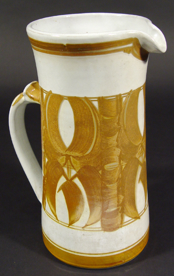 Appraisal: Large Aldermaston studio pottery jug with gold painted decoration black