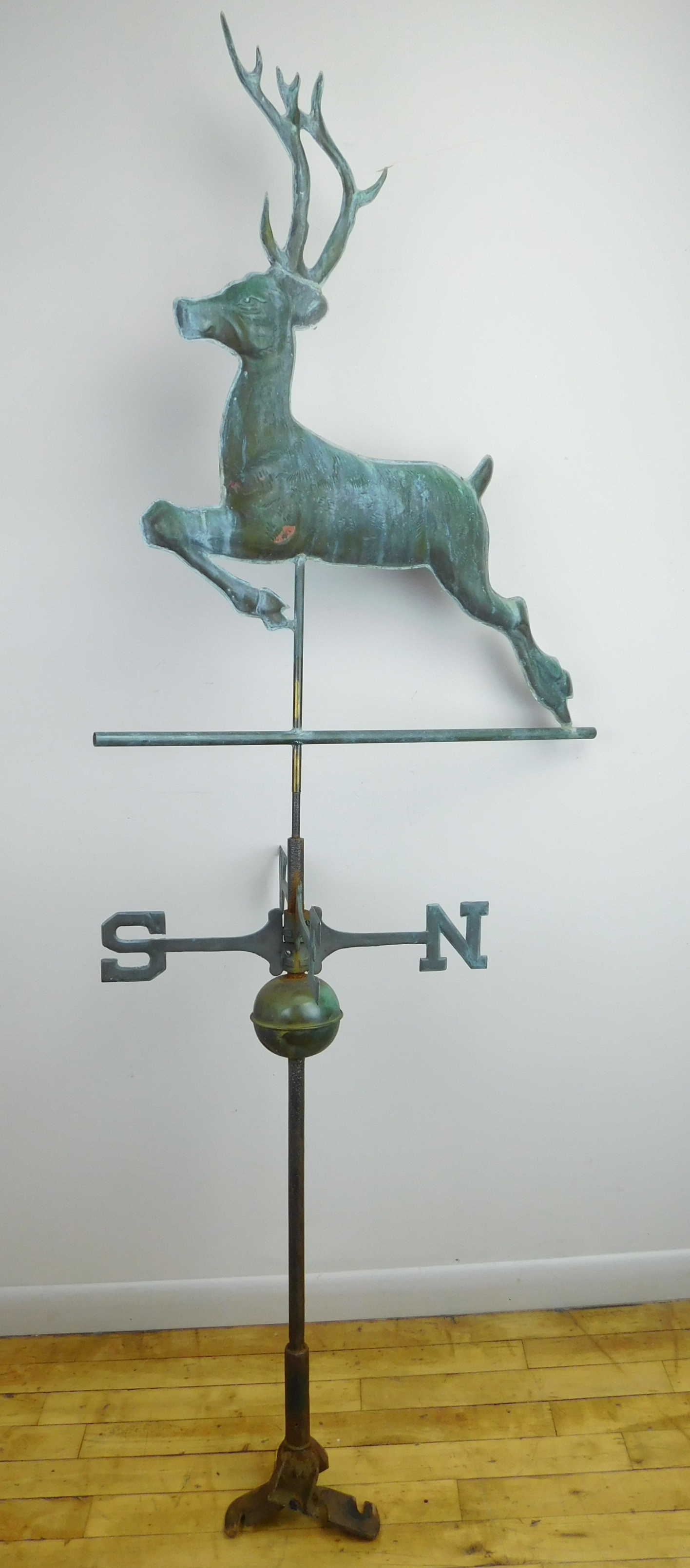 Appraisal: Embossed tin leaping stag weathervane ''h