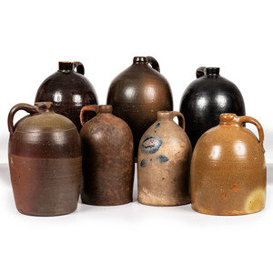 Appraisal: Seven Stoneware Jugs American th Centuryunmarked one having cobalt floral