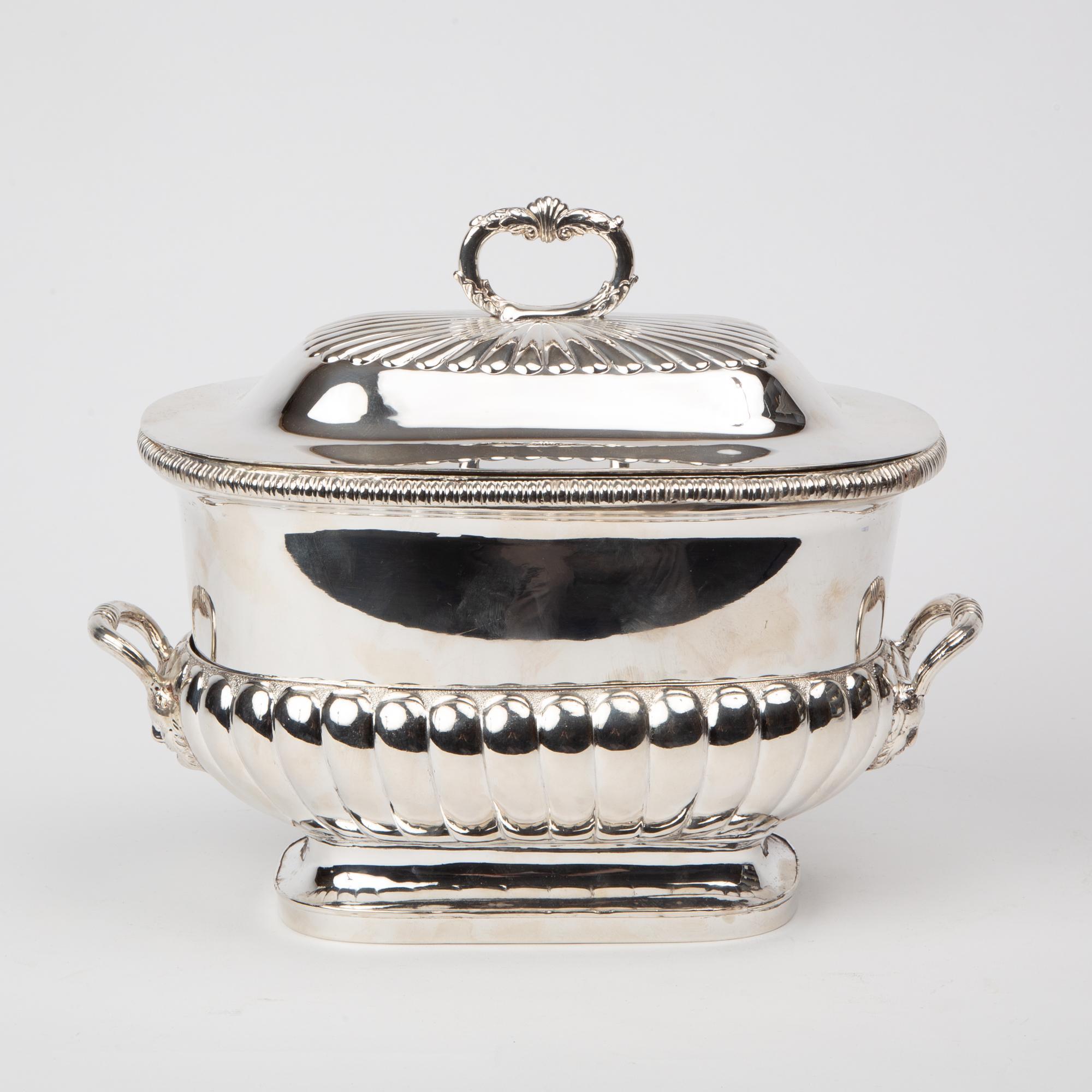 Appraisal: ANTIQUE SILVER-PLATED TUREEN An antique Georgian-style silver-plated tureen that sits