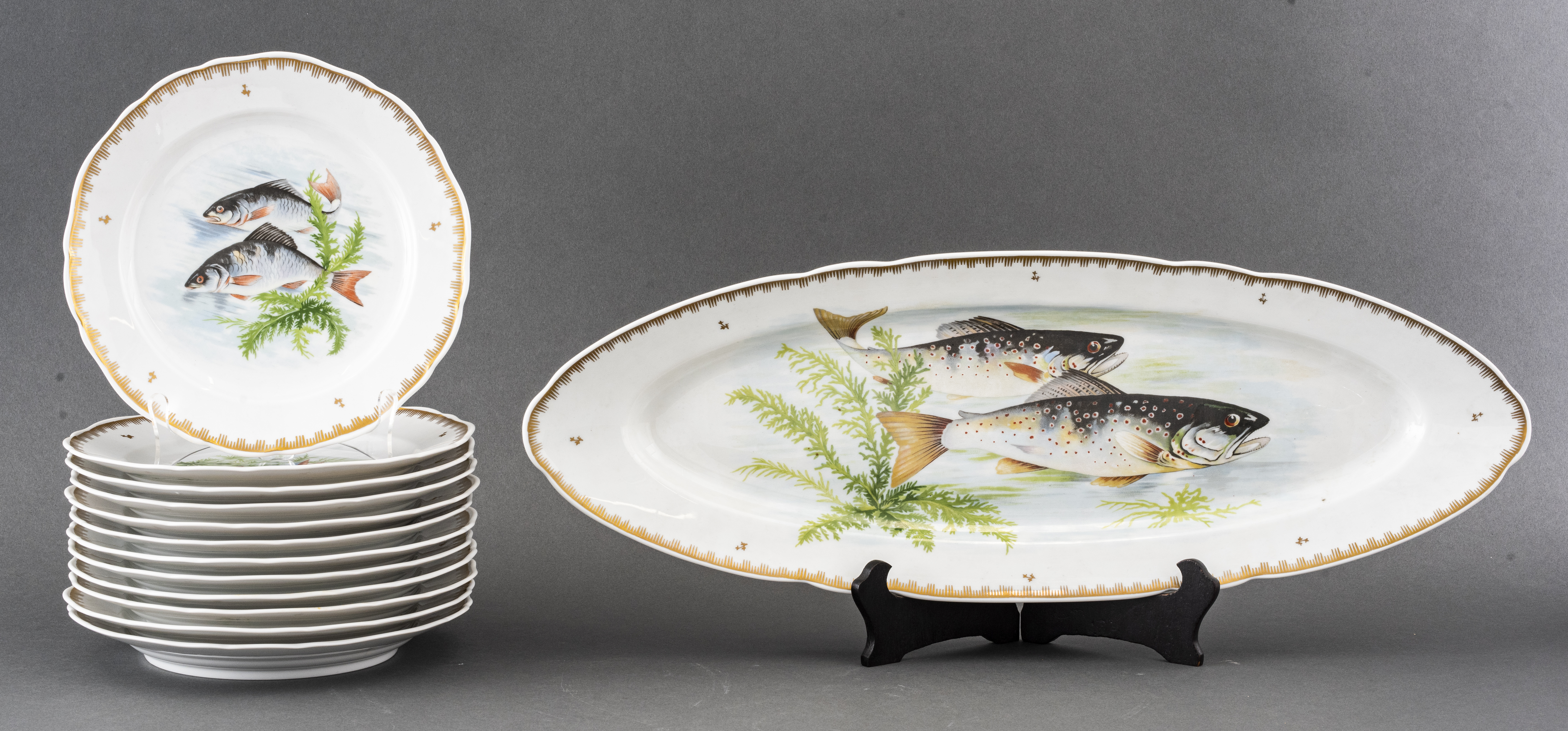 Appraisal: FRENCH PORCELAIN FISH PLATES French set of thirteen porcelain fish