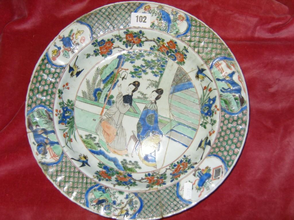 Appraisal: A th century oriental dish of circular form with Famille