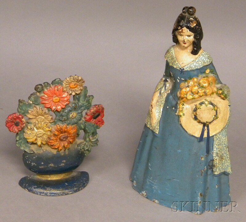 Appraisal: Painted Cast Iron Belle and Vase of Flowers Doorstops belle