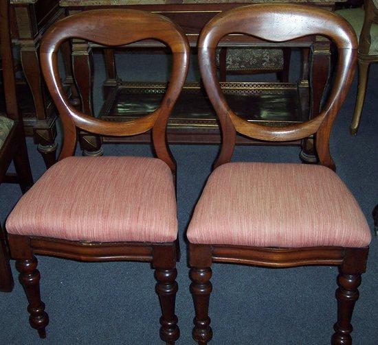 Appraisal: A pair of Victorian mahogany dining chairs with drop in