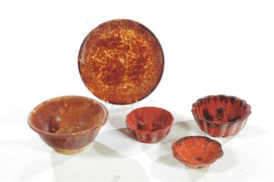 Appraisal: FIVE PIECES OF REDWARE AND ROCKINGHAM American mid th century