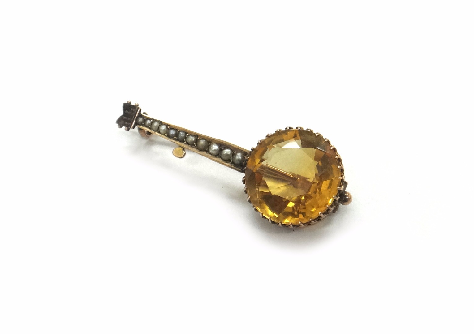 Appraisal: A late Victorian rose gold citrine and half pearl brooch