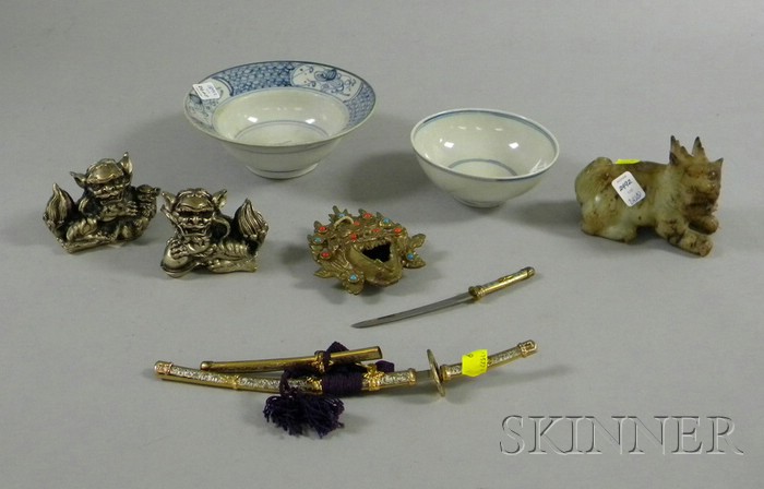 Appraisal: Eight Assorted Decorative Asian Items two swords two blue and