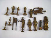 Appraisal: A collection of six brass pipe tampers in the form