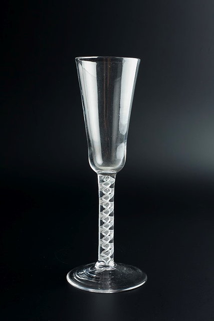 Appraisal: AN TH CENTURY ALE GLASS with tall tapering bowl on