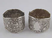 Appraisal: A pair of stylish napkin rings with embossed cherub heads