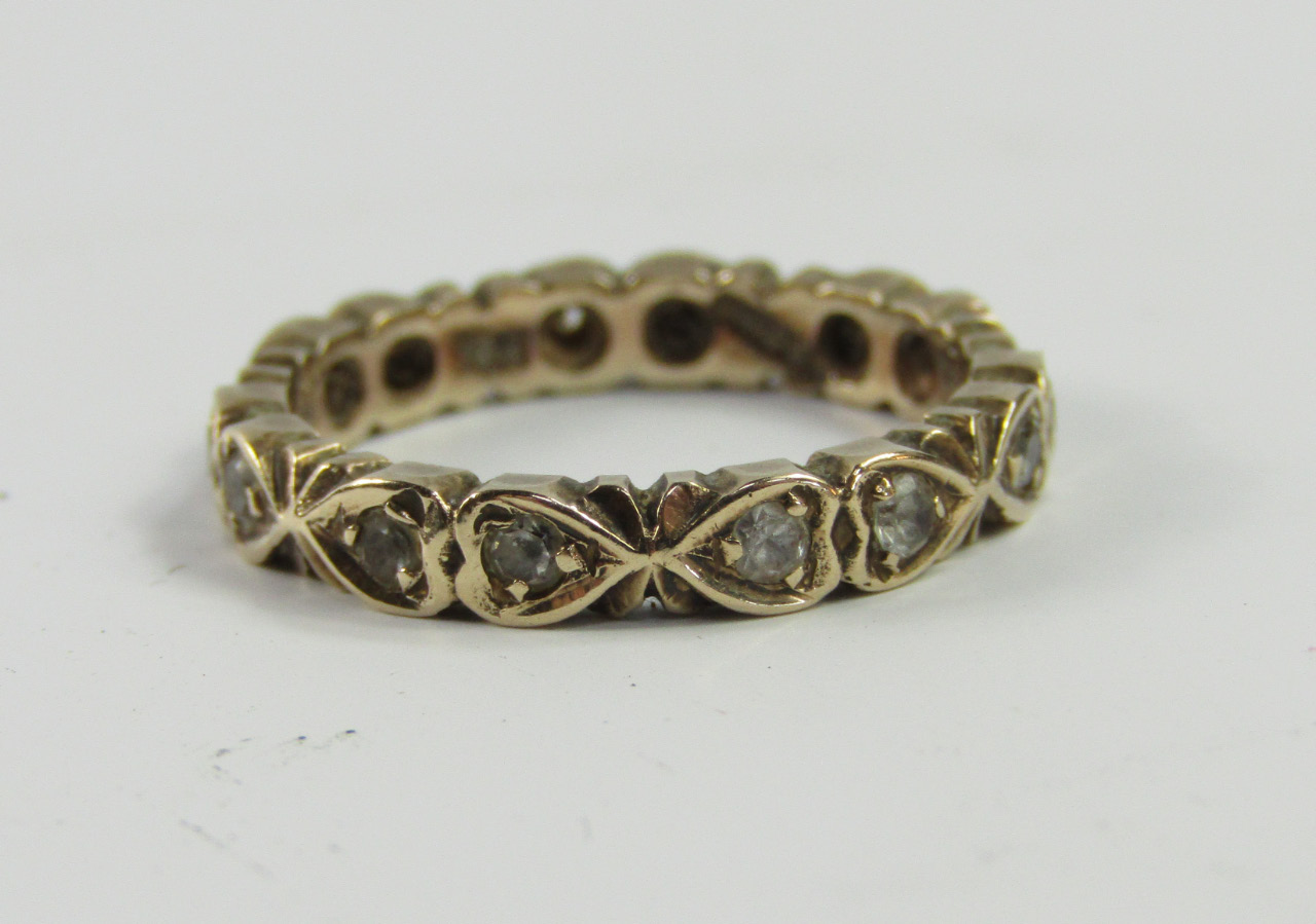 Appraisal: A ct gold and gem set full eternity ring size