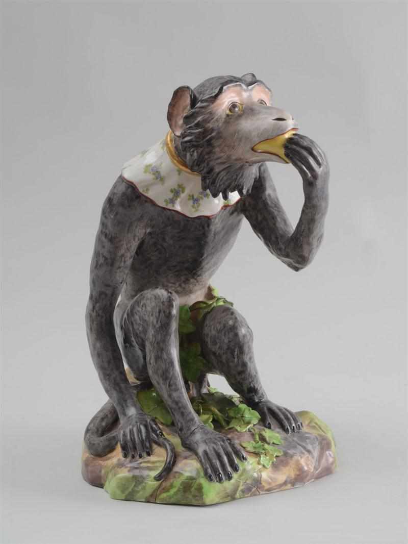 Appraisal: MEISSEN STYLE PORCELAIN FIGURE OF A SEATED MONKEY Wearing a