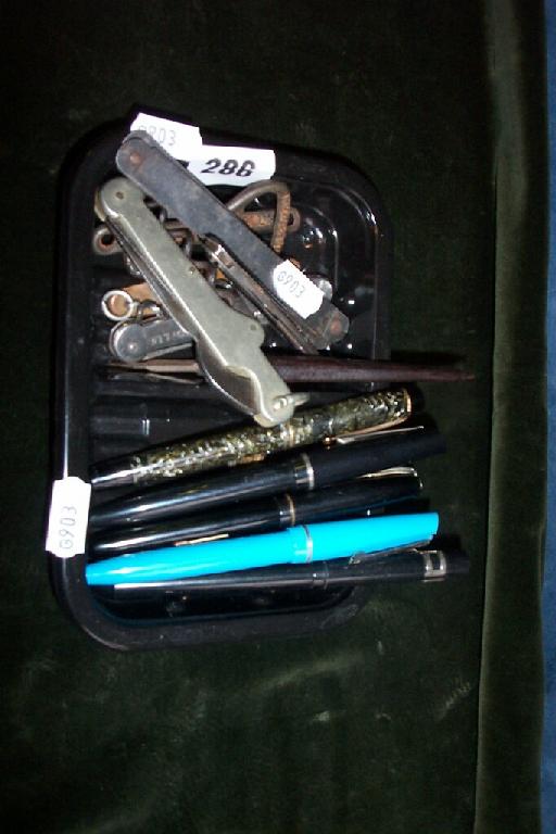 Appraisal: A collection of pocket penknives and bottle openers together with