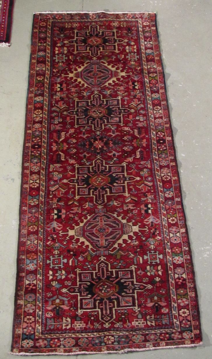 Appraisal: ORIENTAL RUG KARAJA RUNNER ' x ' Seven geometric medallions