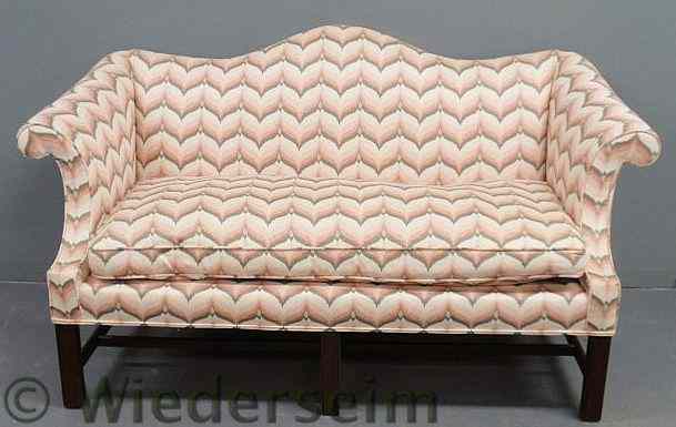 Appraisal: Chippendale style mahogany camelback loveseat by Kittinger h x w