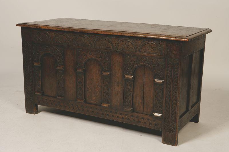 Appraisal: A CHARLES II OAK COFFER with a rectangular top with