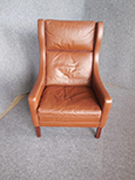 Appraisal: DANISH BROWN LEATHER ARMCHAIR