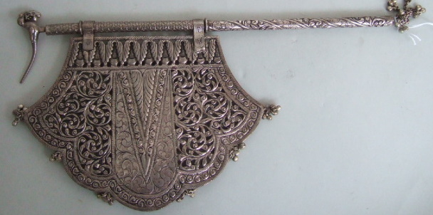 Appraisal: A South East Asian pressed metal hand banner fan th