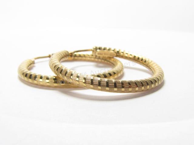 Appraisal: A pair of K yellow gold textured hoop earrings diameter