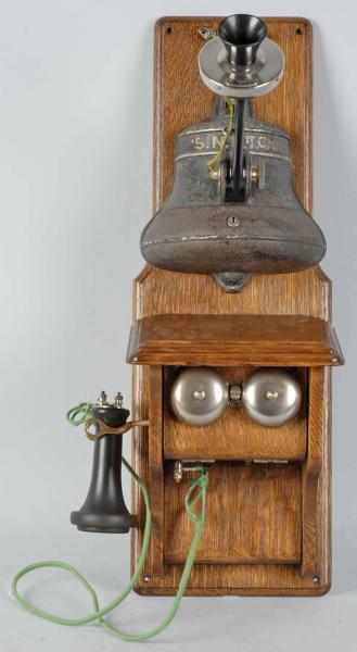 Appraisal: Gray Bell-Shaped Coin Collector Telephone Description Circa Mounted on oak