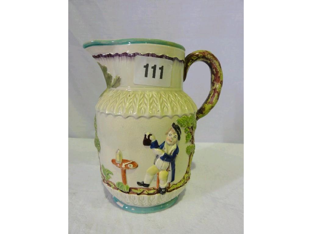 Appraisal: An early th century jug with relief moulded and painted