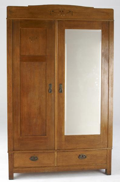 Appraisal: ENGLISH ARTS CRAFTS Armoire in quartersawn oak with mother of