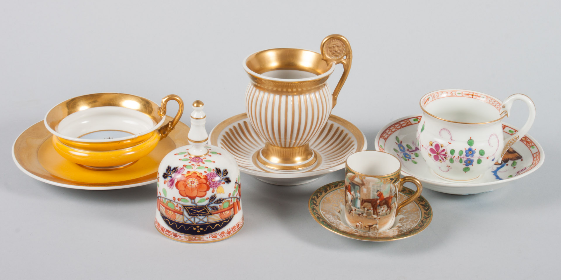 Appraisal: assorted Continental porcelain cups and saucers KPM gilt banded cup