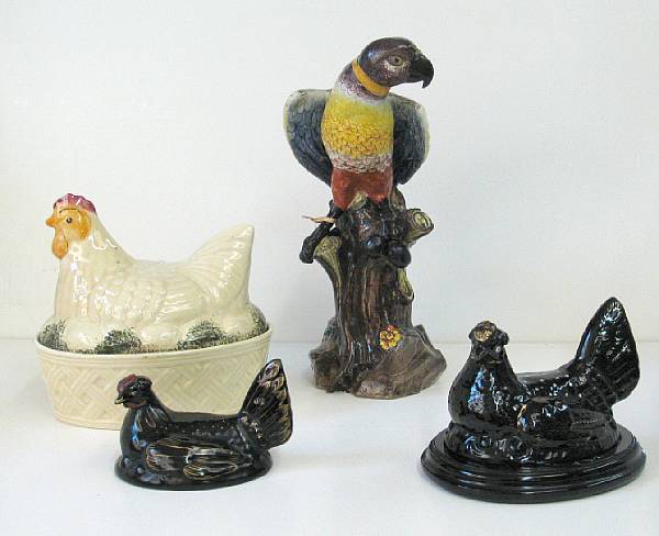 Appraisal: Four ceramic birds th th century Comprising parrot perched on