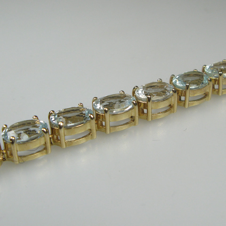 Appraisal: English k Yellow Gold Bracelet set with oval cut aquamarines