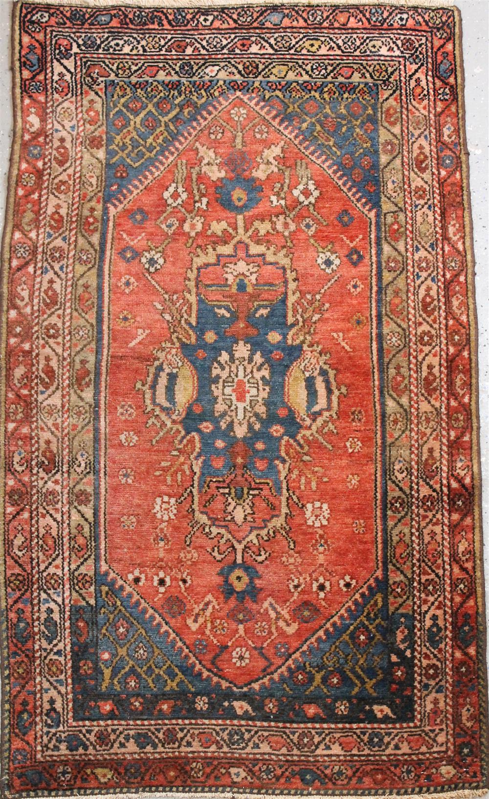 Appraisal: PERSIAN MALAYER RUG having a red ground with central medallion