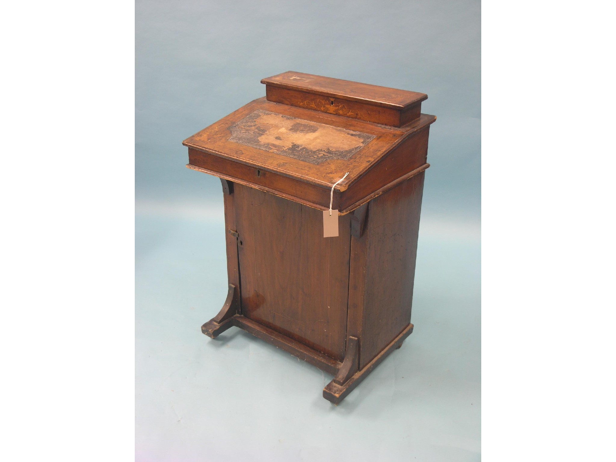 Appraisal: A Victorian inlaid walnut Davenport with cupboard base restoration project