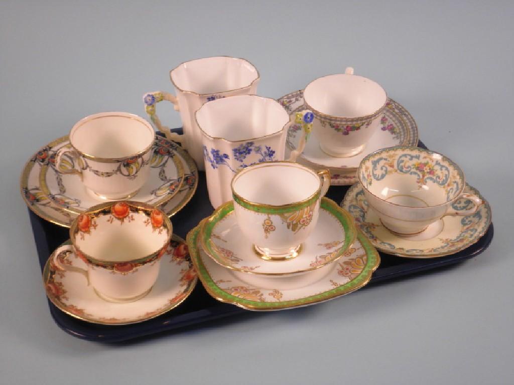 Appraisal: Three porcelain trios a Paragon cup and saucer another cup