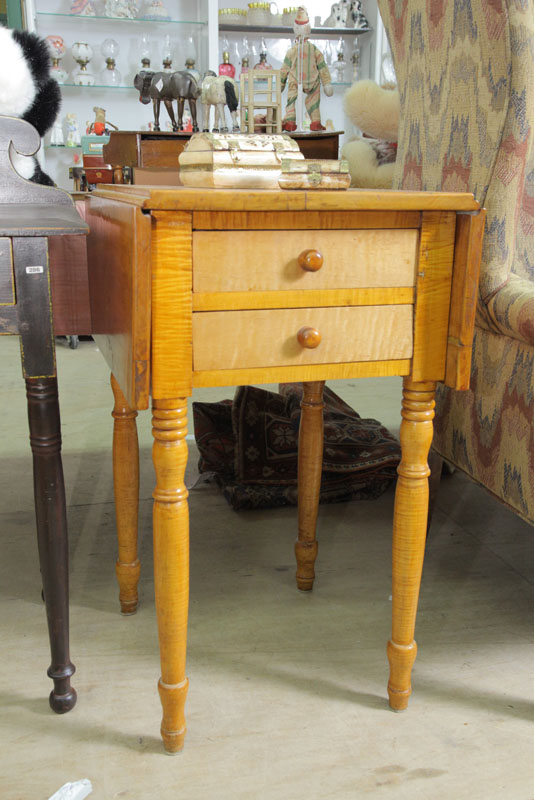 Appraisal: TWO DRAWER DROP LEAF STAND Curly maple with rectangular leaves